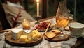 Decorated empty dining table with cheese plate, honey, glass of drink Royalty Free Stock Photo