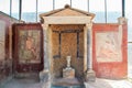 Decorated fountain in a villa of P ompei archeological site Royalty Free Stock Photo