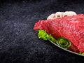 Decorated fresh raw meat - ham with mushrooms and clipping path Royalty Free Stock Photo