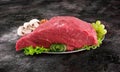 Decorated fresh raw meat - ham with mushrooms and clipping path Royalty Free Stock Photo