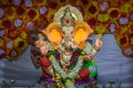 Decorated and garlanded idol of Hindu God Ganesha in Pune ,Maharashtra, India.