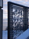 Decorated gate with three women