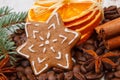 Decorated gingerbread, coffee grains and spices, christmas time Royalty Free Stock Photo