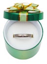 Decorated green box with wedding platinum ring