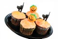 Decorated Halloween Cupcakes On White