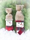 Decorated handmade wooden snowmen