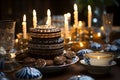 Decorated Hanukkah table with a menorah, gelt and festive blue and white decorations