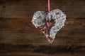 Decorated Heart Shape Christmas Wreath White Twigs Gingham Ribbon Heart on Old Rustic Background