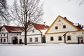 Decorated houses in the Holasovice village in Czechia, registered as UNESCO world heritage site Royalty Free Stock Photo