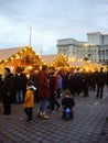 Decorated huge Christmas tree, lights, decorations, hot wine, hot chocolate, presents and people wandering at the Christmas market