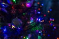 Decorated and illuminated Christmas tree at night, close up. Christmas. Royalty Free Stock Photo