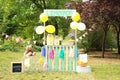 Decorated lemonade stand with glassware