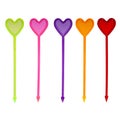 Decorated with multi-colored transparent cocktail sticks in the shape of hearts Royalty Free Stock Photo