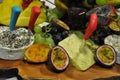 Decorated plate with exotic fruits and cheese