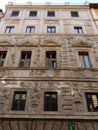 Decorated Pupazzi Palace in Via dei Banchi Vecchi to Rome in Italy.