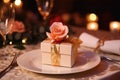 a decorated ring box on a romantic dinner table