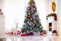 Decorated room with Christmas tree and fireplace Royalty Free Stock Photo