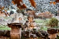 Decorated stone ruins with autumn leaves