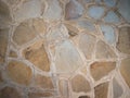 Decorated stone wall in the garden of a house in italy