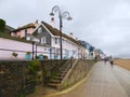 Decorated street lamp and houses