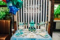 Decorated table with balloons and cake on a child`s birthday