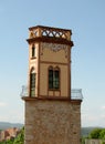 Decorated tower with balconies at village in Girona, Spain