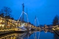 Decorated traditional boats in the harbor from Dokkum in Netherlands at christmas at unset Royalty Free Stock Photo