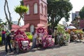 Decorated trishaw with colorful flowers and doll for hire at Malacca city, Malaysia Royalty Free Stock Photo