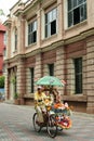 A decorated trishaw or tricycle rickshaw in historical Malacca or Melaka, Malaysia