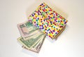 Decorated wallet and money Royalty Free Stock Photo
