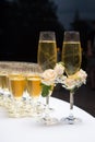 Decorated wedding glasses with champagne