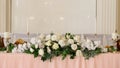 Decorated wedding hall, served tables and dishes, round tables and a bright hall. Royalty Free Stock Photo