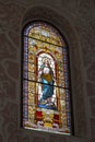 Decorated window in ancient catholic church Royalty Free Stock Photo