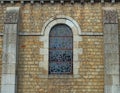 Decorated window on stone bricks wall at cathedral Royalty Free Stock Photo