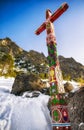 Decorated wooden cross in monument Symbolic cemetery in High Tatras mountains in Slovakia