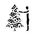 decorating the christmas tree glyph icon vector illustration Royalty Free Stock Photo