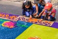 Decorating dyed sawdust Good Friday carpet, Antigua, Guatemala Royalty Free Stock Photo