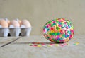 Decorating Easter eggs , eggs made of colorful sequin and pin