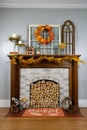 Decorating the fireplace mantel for fall