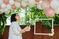 Decorating the garden with balloons for a party, ceremony Royalty Free Stock Photo