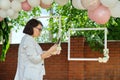 Decorating the garden with balloons for a party, ceremony Royalty Free Stock Photo