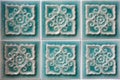 Decorating green ceramic wall tiles