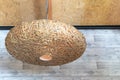 Decorating hanging lantern lamp in wooden wicker cover made from bamboo wood