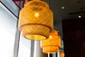 Decorating hanging lantern lamps in wooden wicker made from bamboo.Asian style.Pendant light with wicker lampshade Royalty Free Stock Photo