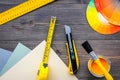 Decorating and house renovation tools and accessories on wooden table background top view Royalty Free Stock Photo