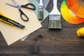 Decorating and house renovation tools and accessories on wooden table background top view copyspace Royalty Free Stock Photo