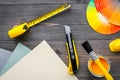 Decorating and house renovation tools and accessories on wooden table background top view mockup Royalty Free Stock Photo