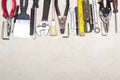Decorating and house renovation tools and other essentials on white background. flat lay composition Royalty Free Stock Photo