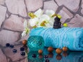 Decoration of bathhouse with buddha, nuts, touwel and candlesti Royalty Free Stock Photo