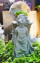 decoration beautiful cute angel statue in garden Royalty Free Stock Photo